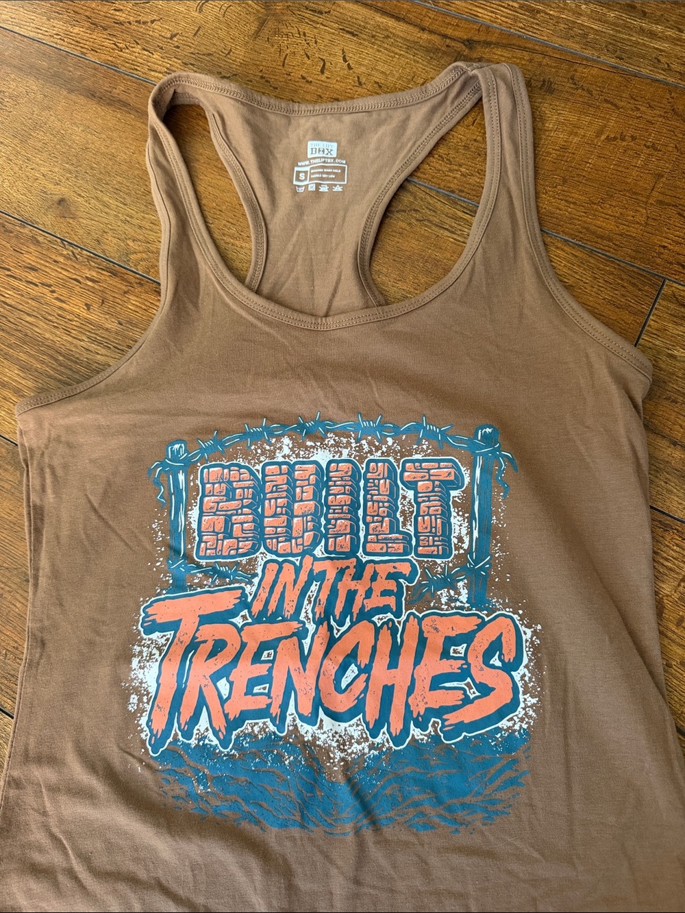 Built In The Trenches Brown Graphic Racerback Tank Top